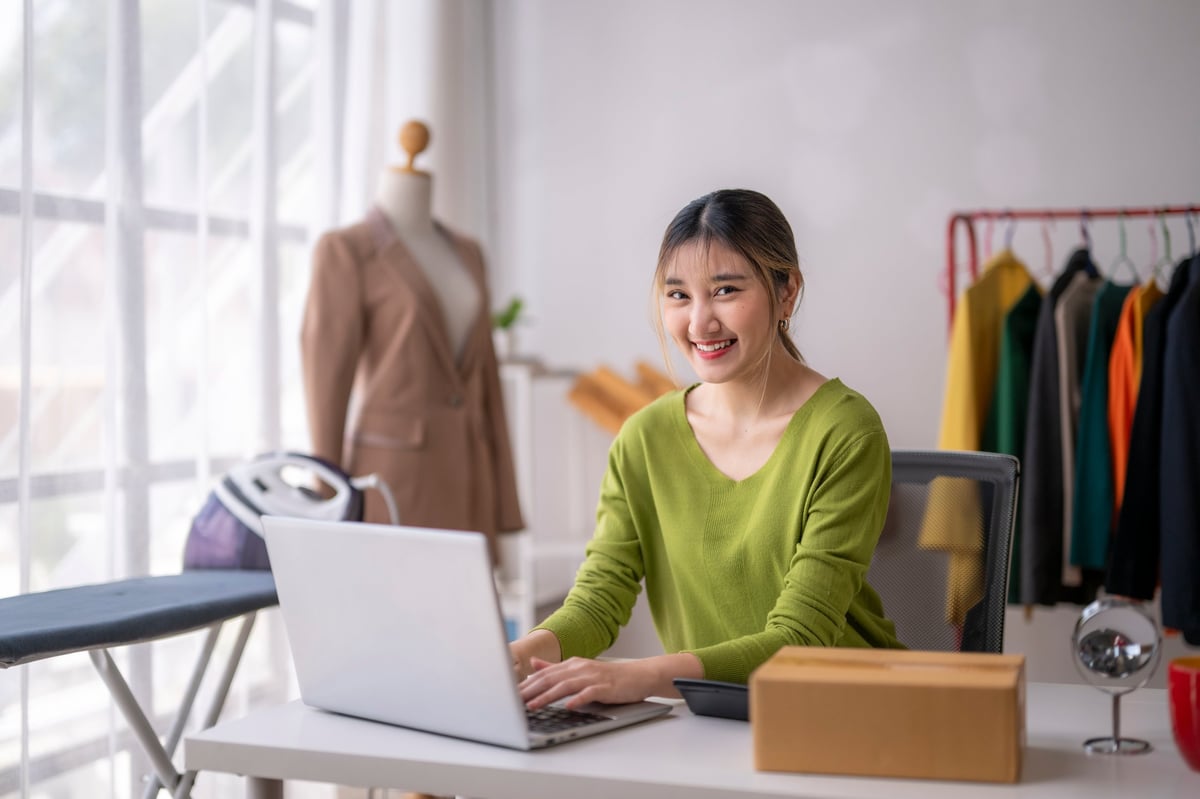 Small business owner managing her shop online